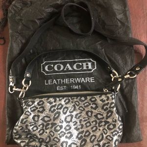 Coach black and silver handbag. Versatile to use everyday or special occasion.